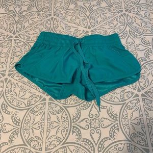 Aqua Rip Curl board shorts